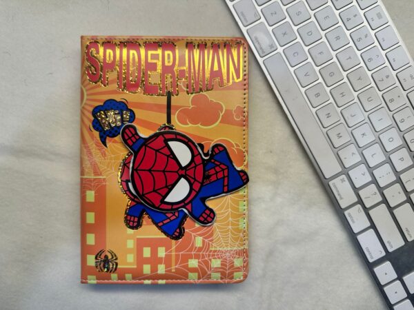 spinning element on the cover, showcasing iconic MRVL superheroes: Captain America, Iron Man, and Spider-Man.